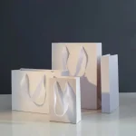 China Custom Paper Bags With Ribbon Handles | Yucaibox