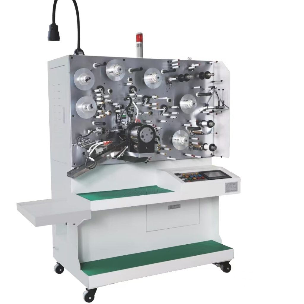 Winding machine for metallized film capacitors