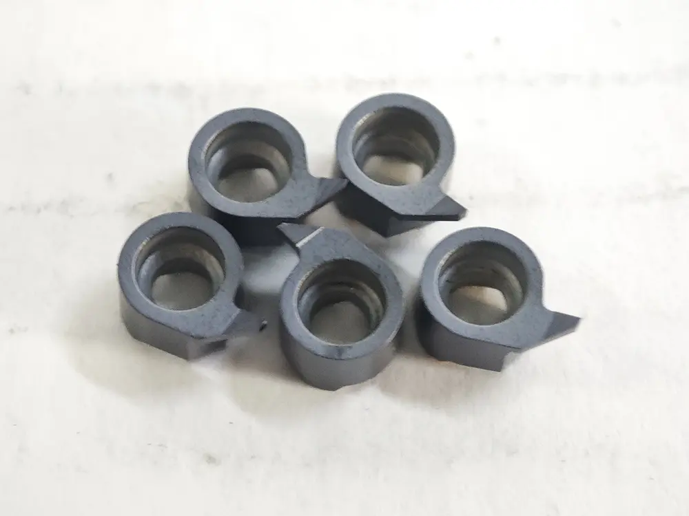 Comma face grooving cutters