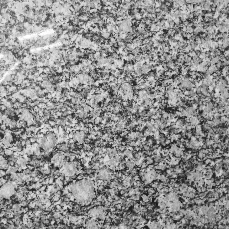 Spray White granite close up