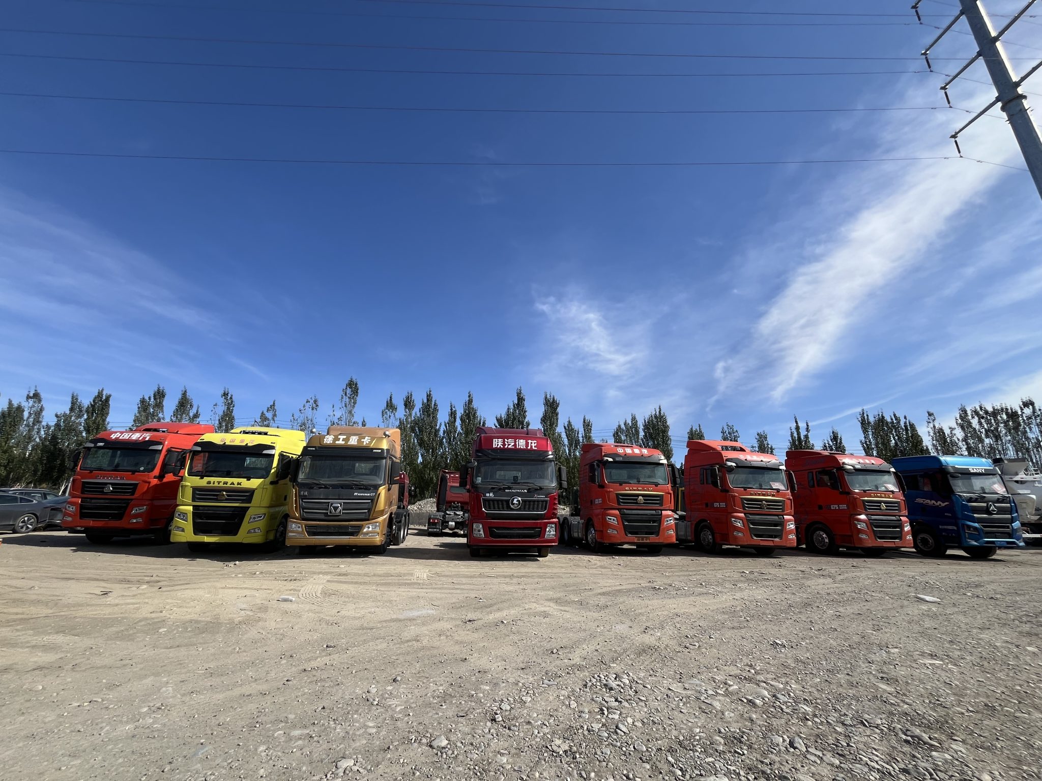 Used trucks in Khorgos yard lined up for on-site inspection
