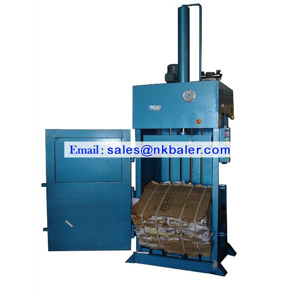 Trash compactor baler