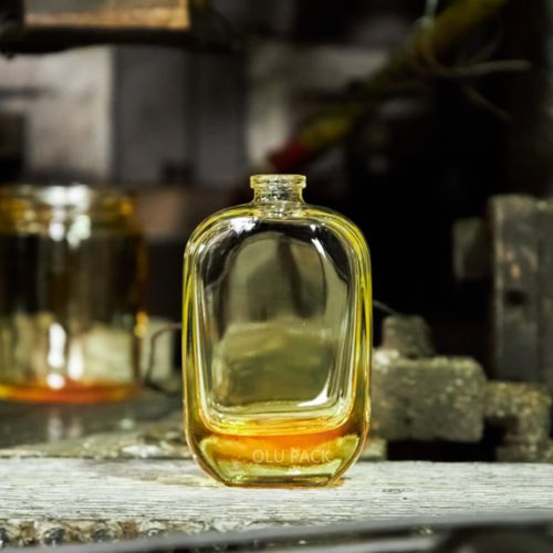 Why are perfume bottles made of glass?