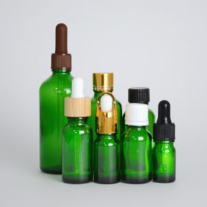 green essential oil bottle