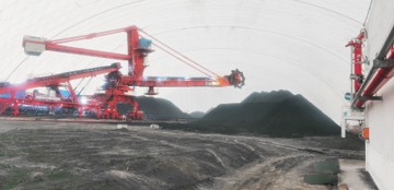 Interior view of the air membrane warehouse in the bar-shaped yard of the bucket-wheel stacker-reclaimer